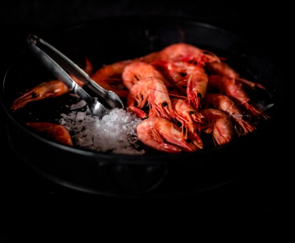 red chili on black round plate